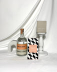 Archie Rose vodka in a peach themed gift box. Great for a birthday gift with koko black chocolate and ecosoy hand poured candle. pressented in a luxury soft touch box