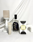 Luxury gin gift hamper containing Lost Phoenix Farm Gin, Koko Black chocolate, Alive hand cream and Ecosoy hand poured candle. Perfect birthday or thank you gift. We deliver Australia Wide