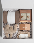 soft camel toy in a gift box with Alive little traveller set, commonfolk soap bar, Ecovask hand towel and Lamington marino wool socks for baby