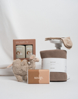 cute unisex baby gift box with soft toy camel, soap bar, ecovask hand towel and marino wool socks