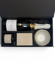 Small luxury gift box featuring Pol Roger Champagne, Ecosoy reed diffuser, hand-poured Ecosoy candle and handcrafted ceramic dishes. Australia wide delivery
