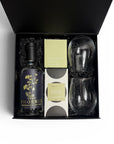 Gin gift box for ladies and men in green tones. Lost Phoenix Farm 700ml gin, koko black chocolate, ecosoy soy hand poured candle and two gin glasses. A great birthday gift.