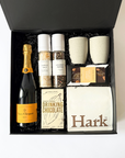 beautiful veuve champagne gift box with tasteology garlic sal and gourmet pepper, ceramic cups, koko black chocolate, local roasted coffee beans and drinking chocolate. All beautifully boxed in our luxury boxes