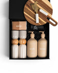 Corporate home settlement gift hamper. Beautiful round wood board, cheese knives with marble handles, Commonfolk wash and lotion, Commonfolk soap and salt and pepper grinders. Perfect for a house warming gift for a friend or colleague. We offer delivery everywhere in Australia