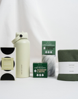 wellness gift box with water bottle by sage and cooper, koko black luxury chocolate kitsch solid shampoo and ecovask hand towel