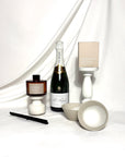 Pol Roger Chapagne home celebration gift hamper containing handcrafted ceramic small dishes, Ecosoy diffuser and Ecosoy soy candle.  We offer delivery Australia wide.