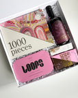 jigsaw puzzle gift in a gift box with lost phoenix farm gin, drinking chocolate, loops face masks and alive lip butter